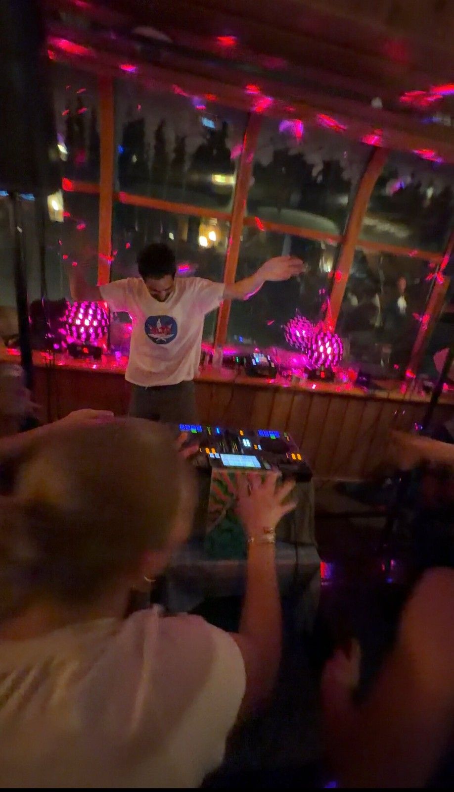 Andrew DJing a live set for a packed room