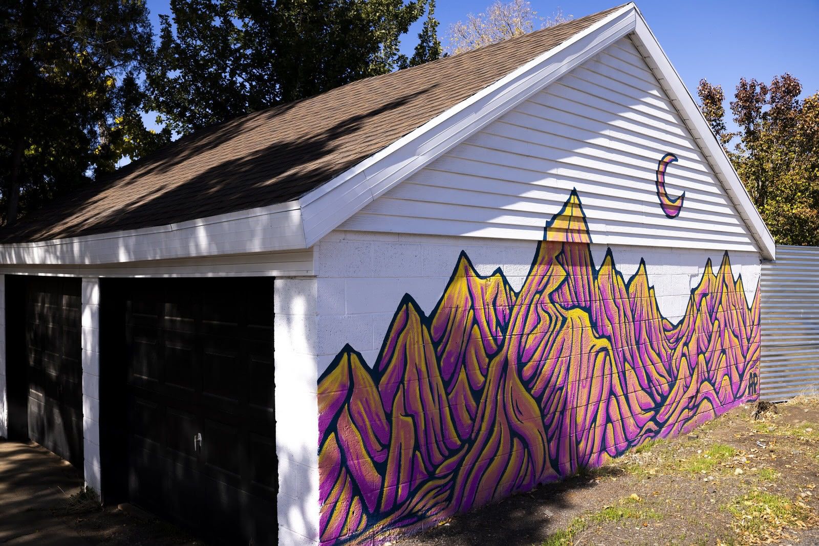 Mountain mural with a crescent moon