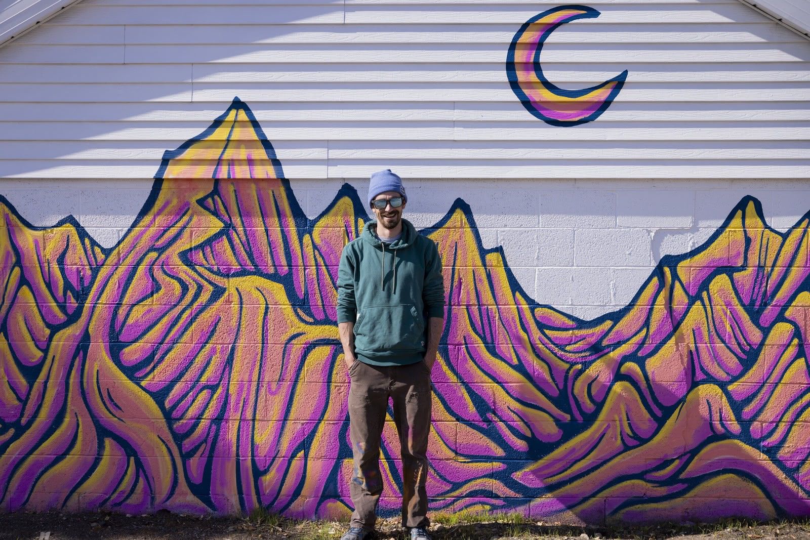 Purple and orange mountain peaks mural